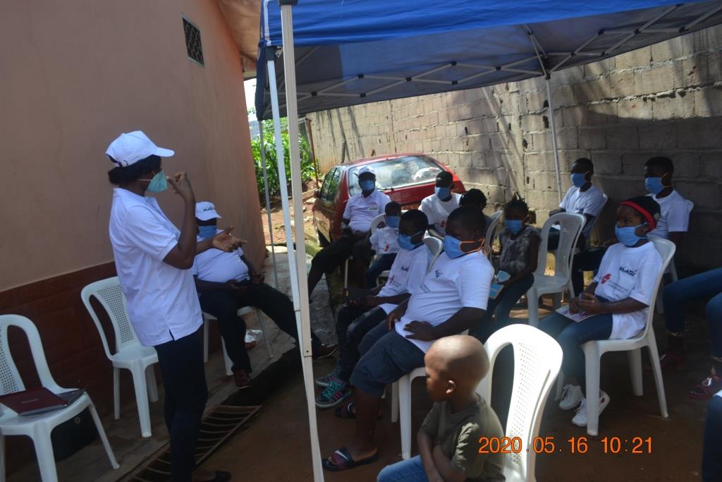 A talk and exchange on the dangers and preventive measures of Covid 19 between Program Officer and project participants. a talk and exchange on the dangers and preventive measures of covid 19 between program officer and project participants